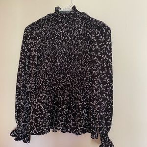 Never worn long sleeved turtleneck.